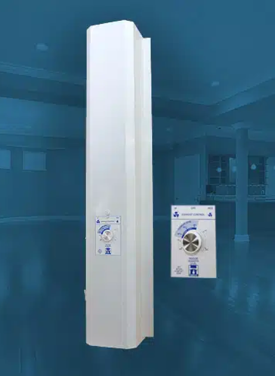 Air curtain with white housing mounted vertically against a blue background, reminiscent of modern basement waterproofing solutions in Bergen County, NJ. A close-up of its control panel is shown beside it, featuring a dial and labeled buttons. The background shows a blurred indoor setting with large windows.